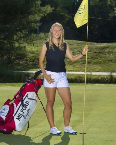 girl with golf flag and bag